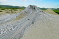 Mud volcano erupting with dirt